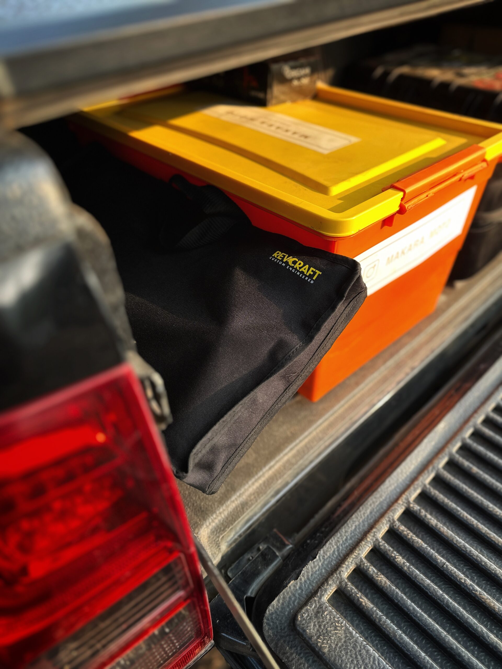 RevCraft MagRack magnetic outdoor tray mounted on a 4x4 steel surface, close-up of three rubber coated magnets on MagRack tray, RevCraft MagRack tray showing embedded spirit level, MagRack outdoor tray with cross bar support for stability, MagRack tray holding coffee cups and snacks during camping, RevCraft MagRack used as a cooking prep tray at an overlanding campsite, MagRack tray mounted on a 4x4 body panel during a roadside stop, RevCraft MagRack powder coated steel tray product close-up, MagRack tray load test with tools and gear, RevCraft MagRack tray packed inside protective carry bag, MagRack tray stored in vehicle trunk for travel, RevCraft MagRack magnetic tray mounted on a 4x4 tailgate, MagRack tray used for organizing recovery gear, RevCraft MagRack outdoor tray used for city dine-in setup, MagRack tray mounted on a steel roof rack side, close-up of MagRack cross bar and mounting structure, RevCraft MagRack tray holding camera gear safely, MagRack tray leveled using spirit level for hot drinks, RevCraft MagRack tray in overland setup with cookware, MagRack magnetic tray for 4x4 camping and outdoor use
