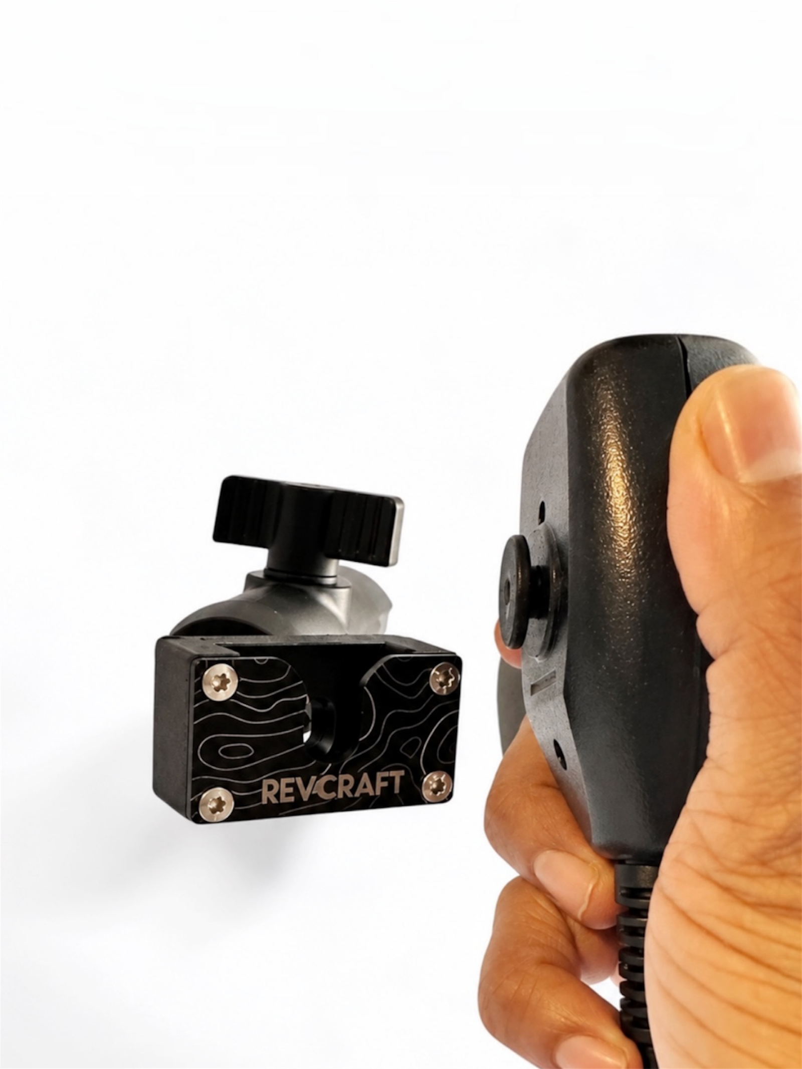 RevCraft x-talkie mouthpiece holder, designed to securely mount and keep a walkie-talkie microphone easily accessible on motorcycles, 4x4s, and off-road vehicles.